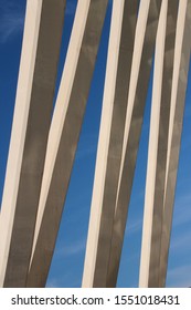 White structural elements with an intense blue sky background