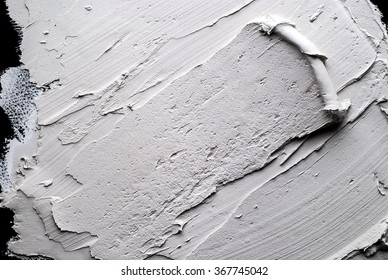 white Structural plaster on black wall