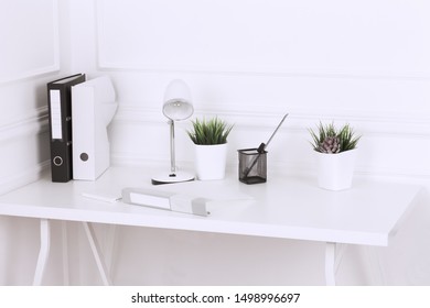 White And Stylish Home Interior With Cool Office Accessories, Notes, Boxes, Pencils And Air Plant
