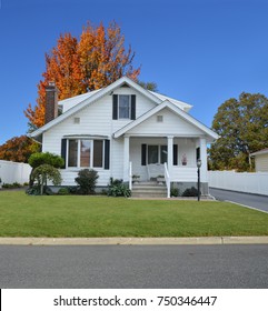 White Suburban Bungalow Home Blue Sky USA