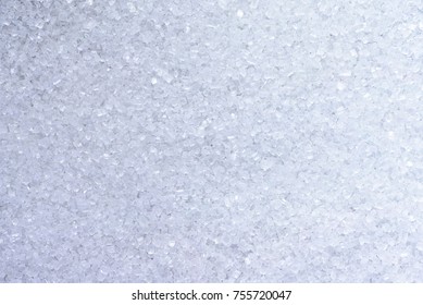 White Sugar Crystals Closeup As Texture.