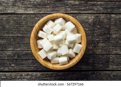 White Sugar Cubes In Bowl.