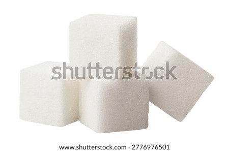 White sugar cubes stacked composition, isolated on white background