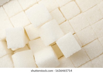 White sugar cubes texture background, close up