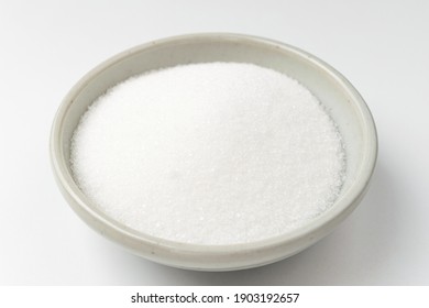 White sugar on white background