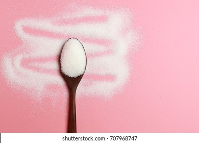 White Sugar On A Pink Background