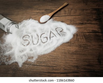 white sugar on wood table with sugar spread and written text . - Powered by Shutterstock