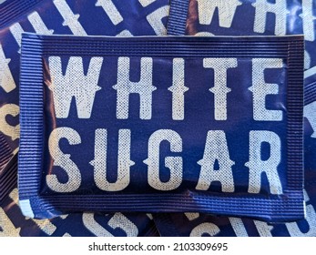 White Sugar Packet. Paper Warp Sealed Package Sweetener Sugar For Tea Or Coffee.