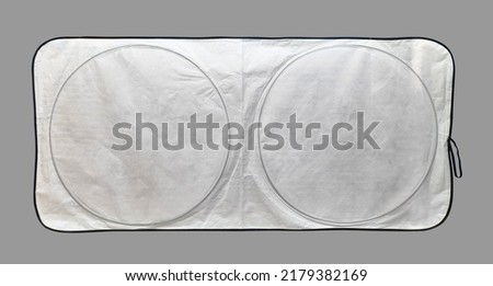 White sunshade taiwak , Sunshade white colour isolated in grey background, plain sunshade white in colour, car shade blank for mockup design, taiwak sunshade blank material
