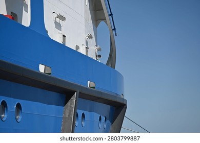 The white superstructure and blue side of the ship