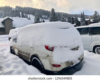 White SUV Completely Covered In Snow After Snowstorm In Montana