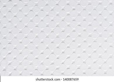 White synthetic leather with embossed texture background