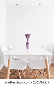 white table and chairs