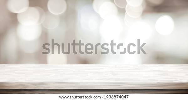 White table presentation, desk and blur background,\
Empty wood counter, shelf surface over blur restaurant white bokeh\
background, Wood table top for retail shop, store product display\
banner, mock up