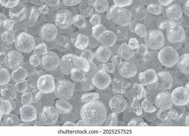 White table salt crystals under microscope, image width 9mm, abstract science background