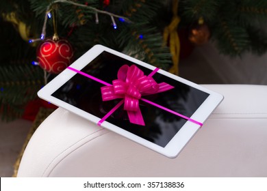 White Tablet As A Gift Under The Christmas Tree