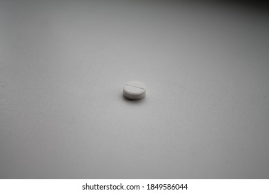 white tablet on a white background close up