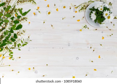 White tabletop with spring flowers
