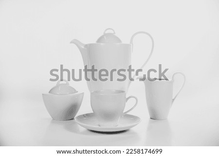 A white tableware teaset on white backround