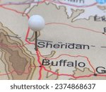 White tack on map of Sheridan, Wyoming. This city is the county seat of Sheridan County, WY.