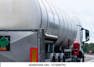 White Tanker Lorry On The M1 Motorway UK, Large Truck Haul, Delivery, Fuel, Tarmac, 