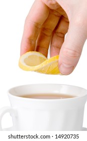 White tea cup and slice of lemon