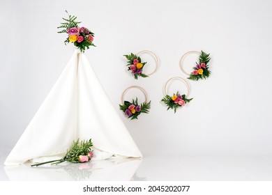 White Teepee Background With Spring Flowers For One Year Old Baby Photoshoot