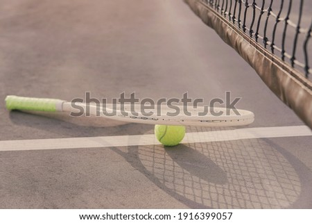 White tennis racket and green ball on court, Olympic sports, active, wellness concept