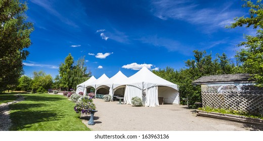 White Tents Set Up For A Large Party Or Gathering