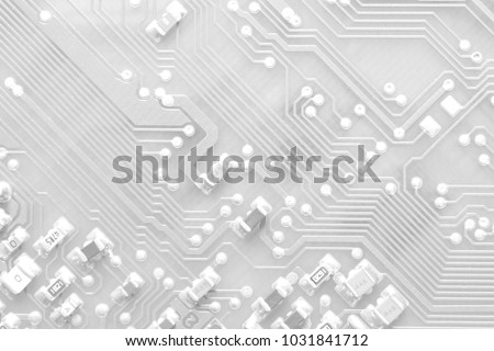 White texture background of printed circuit board. Electronic computer hardware technology. Tech science background. Integrated communication processor. Information engineering component.