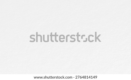 White textured background with a subtle paper-like feel. The white background adds a clean, minimalist style to any design. Gray desktop wallpaper with copy space.