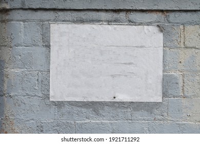 White Textured Empty Street Flyer Texture On Grey Urban Brick Wall