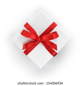 White Textured Gift Box With Red  Ribbon Bow, From Above