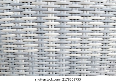 White Textured Surface Of Interlaced Rattan Strings. Basket Weave Pattern Closeup Textured Background, Handicraft Concept. White Bamboo Wood Texture. White Wicker Background. Perfect Simplistic Design