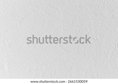 white textured wall surface background closeup with fine grain pattern