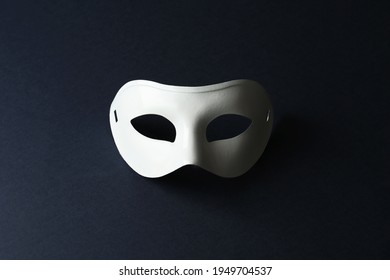 White Theatre Mask On Black Background, Top View