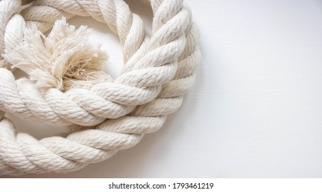 White Thick Rope Isolated On A White Background.Space For Your Text