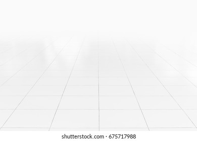 White tile floor clean and symmetry with grid line texture in perspective view for background. Flooring permanent covering by tile, Square shape of white tile made from ceramic material covering floor - Shutterstock ID 675717988