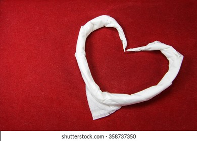 White Tissue Heart On Red Velvet 