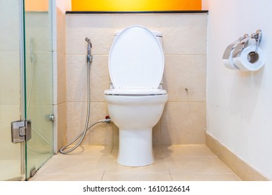 White toilet bowl seat decoration interior of bathroom