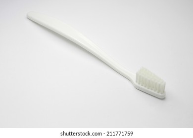 White Toothbrush On White Background Isolated