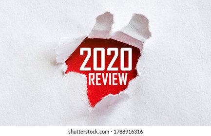 White Torn Paper With Text 2020 Review On Red Background