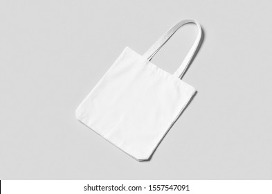 White Tote Bag Mockup On A Grey Background.