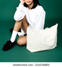 White Totebag With Female Model Wearing Long Sleeve Tshirt,socks And Shorts