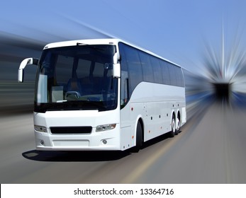 A White Tour Bus Set Against A Motion Blurred Background