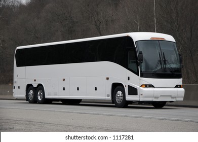 White Tour or Private Charter Bus on the Highway - Shutterstock ID 1117281