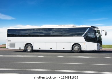 White tourist bus on the highway in travel
