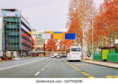 White Touristic Bus In Road. Tour Modern Shuttle Bus Back On Highway. Urban Transport With Driver. Excursion Long Transit Vehicle. In Maribor, Slovenia