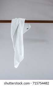 White Towel Hanging On Clothesline