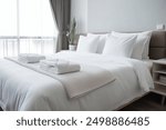 White towel on Bed Luxury Hotel